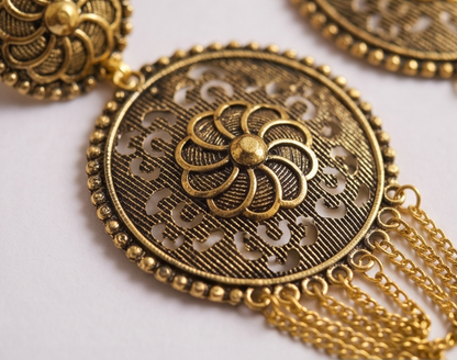 Traditional Gold-Toned Filigree Jhumka Earrings with Pearl Tassels